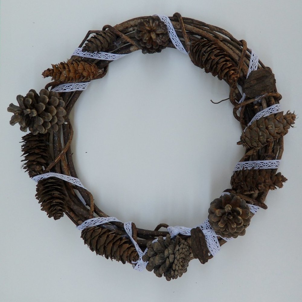 Pine cone wreath with white lace